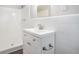 Small bathroom with white vanity and tiled shower at 3686 Thurman Rd, Atlanta, GA 30349