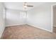 Bedroom with ceiling fan and neutral decor at 3686 Thurman Rd, Atlanta, GA 30349