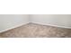 Simple bedroom with neutral walls and carpet at 3686 Thurman Rd, Atlanta, GA 30349