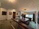 Formal dining room with a large table, chandelier and hardwood floors at 3688 Woodglen Sw Ct, Lilburn, GA 30047