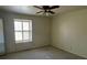 Simple bedroom with window and ceiling fan at 3825 Lavista Rd # Q3, Tucker, GA 30084