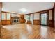 Spacious Gathering room features hardwood floors, a fireplace, and built-in shelving at 601 Trombley Bay Ln, Lawrenceville, GA 30044