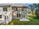 Two townhouses with private backyards, patios, and shared white vinyl fence at 1080 Cades Walk, Lawrenceville, GA 30045