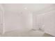 Spacious bedroom with plush carpeting and access to a full bathroom at 1080 Cades Walk, Lawrenceville, GA 30045