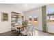 Elegant dining area with hardwood floors and a view of the backyard at 1080 Cades Walk, Lawrenceville, GA 30045