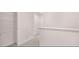 Upstairs hallway with linen closet and carpet at 1080 Cades Walk, Lawrenceville, GA 30045