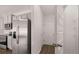 Modern kitchen with stainless steel appliances and pantry at 1080 Cades Walk, Lawrenceville, GA 30045