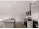 Modern kitchen with stainless steel appliances and granite at 1080 Cades Walk, Lawrenceville, GA 30045