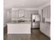 Kitchen with granite countertops and island at 1080 Cades Walk, Lawrenceville, GA 30045