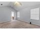 Main bedroom with vaulted ceiling, neutral walls and carpet at 720 Hillandale Ln, Lithonia, GA 30058