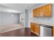 Open dining area with wood flooring and access to kitchen at 720 Hillandale Ln, Lithonia, GA 30058