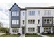 Two-story townhouses with modern design, neutral color palettes, and landscaping at 2425 Red Maple Xing # 125, Smyrna, GA 30080