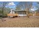 Spacious backyard with a deck and firepit at 2934 Seagull Dr, Duluth, GA 30096