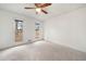 Bright and airy bedroom with ceiling fan and two windows at 2934 Seagull Dr, Duluth, GA 30096