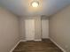 Simple bedroom with two closets and hardwood floors at 315 Horseshoe Bnd, Riverdale, GA 30274