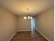 Formal dining room with hardwood floors and a chandelier at 315 Horseshoe Bnd, Riverdale, GA 30274