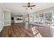 Spacious living room with hardwood floors and sliding glass doors at 1795 Laurel Creek Dr, Lawrenceville, GA 30043