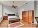 Bright bedroom with hardwood floors, ceiling fan, and ample closet space at 57 Forsyth Nw St # 4D, Atlanta, GA 30303
