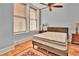 Spacious bedroom with hardwood floors and large windows at 57 Forsyth Nw St # 4D, Atlanta, GA 30303