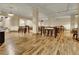 Common area with tables and chairs on wood floors at 57 Forsyth Nw St # 4D, Atlanta, GA 30303