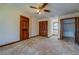 Large bedroom with ample closet space and ceiling fan at 1060 River Cove Rd, Social Circle, GA 30025