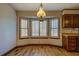 Bright dining area with bay window and wood flooring at 1060 River Cove Rd, Social Circle, GA 30025