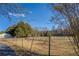 Driveway next to fenced pasture at 1060 River Cove Rd, Social Circle, GA 30025