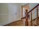 Spacious entryway with hardwood floors and staircase at 1060 River Cove Rd, Social Circle, GA 30025