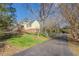 Yellow house with wrap around porch at 1060 River Cove Rd, Social Circle, GA 30025