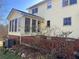 House exterior showcasing a sunroom addition and brickwork details at 1060 River Cove Rd, Social Circle, GA 30025