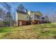 Ranch house with sunroom and detached garage at 1060 River Cove Rd, Social Circle, GA 30025
