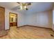 Bright living room with hardwood floors and access to the bathroom at 1060 River Cove Rd, Social Circle, GA 30025