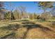 Large, open field with scattered trees at 1060 River Cove Rd, Social Circle, GA 30025