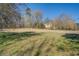 Pasture with distant home and trees at 1060 River Cove Rd, Social Circle, GA 30025