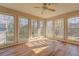 Sunroom with large windows offering natural light at 1060 River Cove Rd, Social Circle, GA 30025