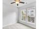 Bright bedroom with carpet and ceiling fan at 1923 Rogers Ct, Atlanta, GA 30318
