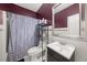 Clean bathroom with a shower/tub combo and white vanity at 250 Windsor Way, Fairburn, GA 30213