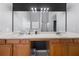 Double vanity bathroom with a large mirror and plenty of counter space at 250 Windsor Way, Fairburn, GA 30213