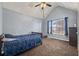 Cozy bedroom with a single bed and a window providing natural light at 250 Windsor Way, Fairburn, GA 30213