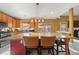Granite kitchen island with seating for four and plenty of counter space at 250 Windsor Way, Fairburn, GA 30213