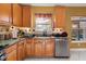 Well-equipped kitchen with granite counters and ample cabinet space at 250 Windsor Way, Fairburn, GA 30213