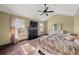 Large main bedroom with fireplace, high ceilings and lots of natural light at 250 Windsor Way, Fairburn, GA 30213