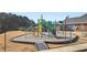 Community playground with modern equipment at 250 Windsor Way, Fairburn, GA 30213