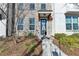 Inviting front entrance to a townhome, with brick facade and landscaping at 3957 Knox Park Ovlk, Duluth, GA 30097