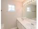 Double vanity bathroom with a large mirror and plenty of counter space at 3050 Raven Trc, Fairburn, GA 30213