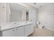 Bathroom with double vanity and toilet at 3050 Raven Trc, Fairburn, GA 30213