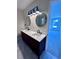 Double vanity bathroom with modern lighting and mirrors at 2759 Kerri Pl, Lithia Springs, GA 30122