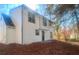 Side view of a freshly painted two-story house with a patio at 2759 Kerri Pl, Lithia Springs, GA 30122