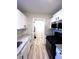 Updated kitchen with stainless steel appliances and marble backsplash at 2759 Kerri Pl, Lithia Springs, GA 30122