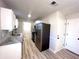 Modern kitchen features stainless steel appliances and granite countertops at 2759 Kerri Pl, Lithia Springs, GA 30122